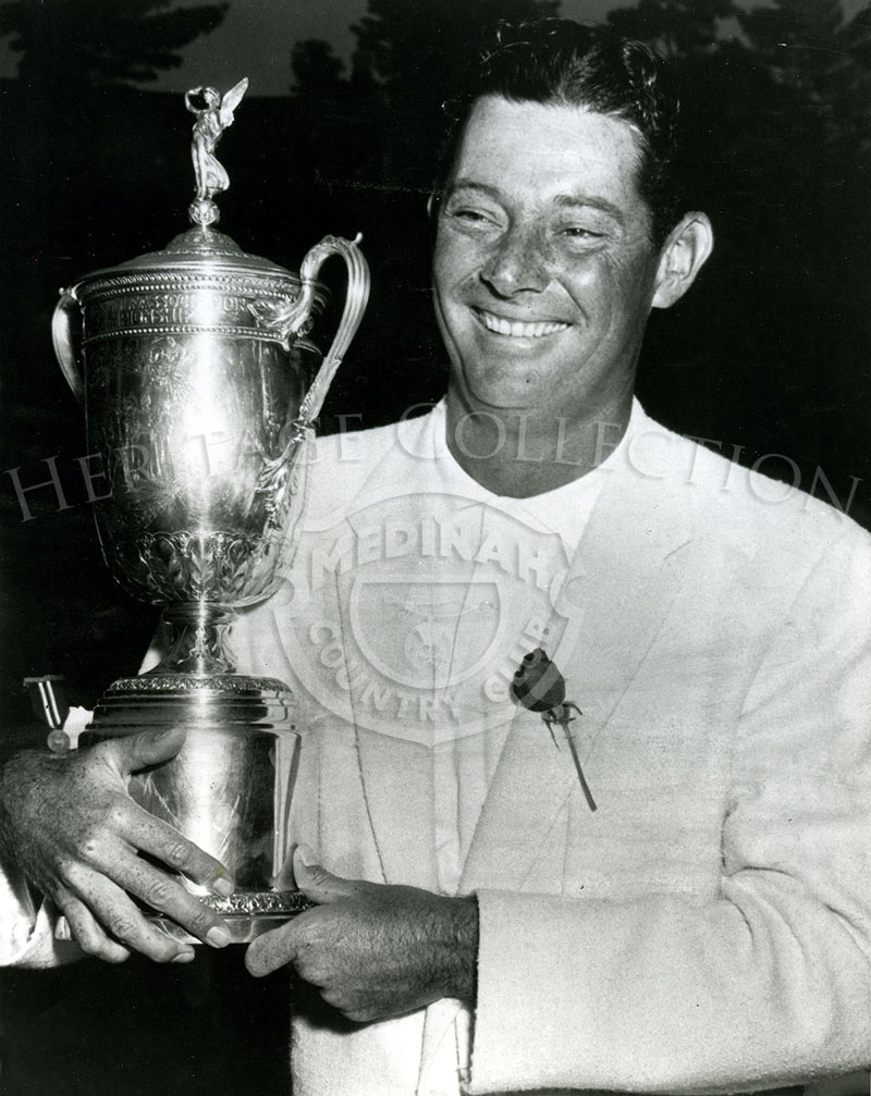 Dr. Cary Middlecoff holding trophy after winning the 49th U.S.Open Championship at Medinah Country Club, June 9-11, 1949.