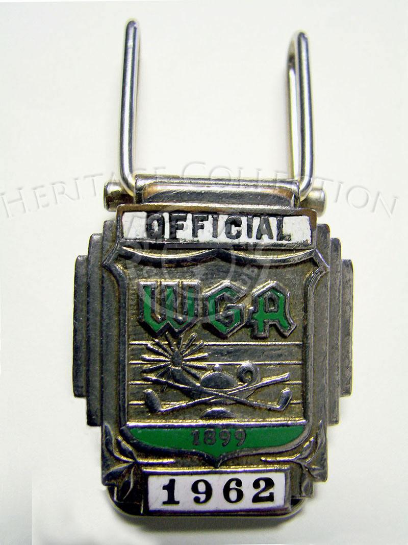 Metal money clip with WGA (Western Golf Association) initials from the 59th Western Open in 1962. The WGA was founded in 1899 when a group of men got together to form an organization to promote golf in the western region.
