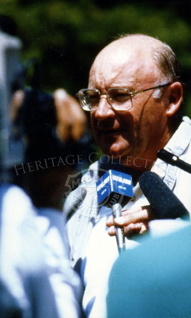 Miller Barber is seen being interviewed after the Ninth U.S. Senior Open Championship.  Barber was 57 years old when he completed, and although he did not score in the top ten that year, he did win three other Senior Open tournaments during his golfing career.