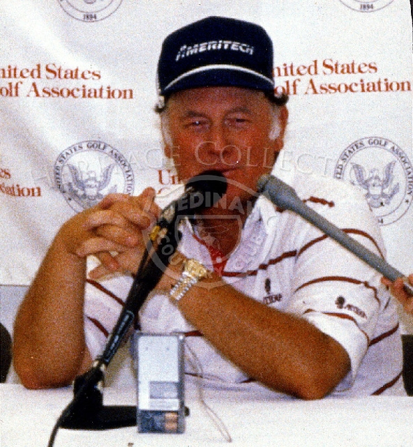 Billy Casper, the 57-year old American professional golfer, is pictured answering questions from the media upon conclusion of the Ninth Senior Open Championship. Casper tied for 10th place with Butch Baird.