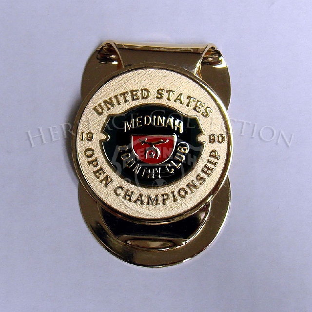 The 90th U.S. Open Championship commemorative money clip measures 2 1/4-inch long and 1?-inch wide. It features the official Medinah Country Club logo.