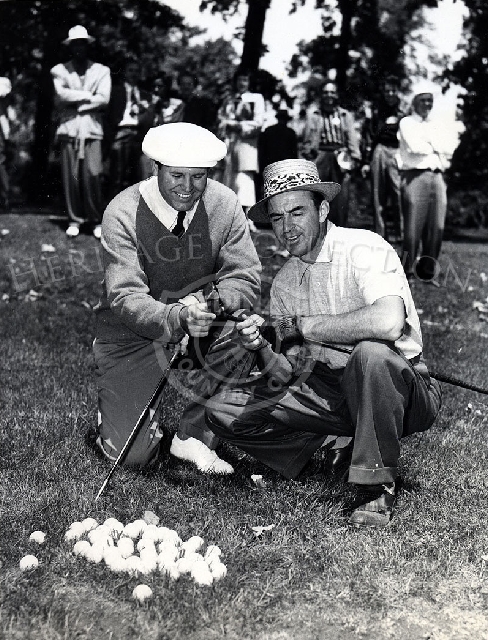 Sam Snead (right), national PGA and Masters champion from White Sulphur Springs, W. Va., showed his driver to Ralph Guldahl, Chicago, after completing a practice round at Medinah Country Club, near Chicago, on June 8. They competed in the National Open Golf Tournament which began June 9, 1949.
