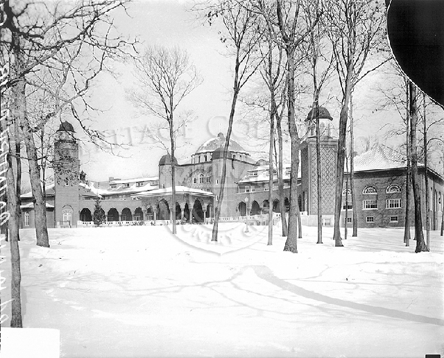 Winter scene of front of Medinah Country Club clubhouse from 1929.
