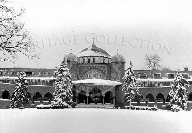 Winter scene up close of clubhouse entrance. Photographed by E. Feeney, Jan. 6, 1974.