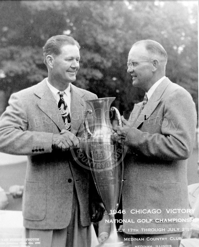 Byron Nelson (left) received the winner's trophy from Chicago District Golf Association (CDGA) president Bob Hulbert, at the conclusion of the Chicago Victory National Golf Championship. Nelson shot a 279, which was five under par for Medinah's 6,650