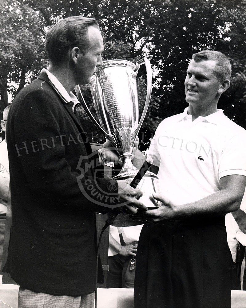 In the WGA tradition, the defending champion passes the J.K. Wadley Trophy to the new champion. It was Arnold Palmer, 1961 champ, who handed the award to 1962 winner Jacky Cupit at Medinah. (Palmer got the trophy back the next year at Beverly).