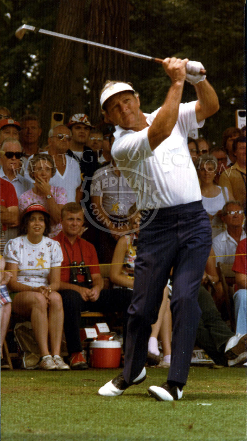 Members of 'Arnies Army' watch intently as Arnold Palmer blasts a shot during the 75th U.S. Open. Palmer tied with Tom Watson and Pat Fitzsimons for 9-ninth place. Same as photo 83241.