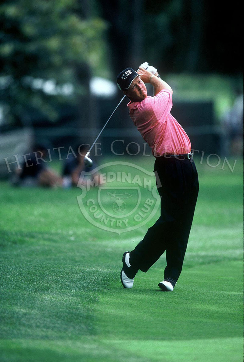 Known for a good drive, John Cook is captured mid-swing during the 81st PGA tournament. For the first few rounds of the tournament, Cook was grouped with Jeff Maggert and J.P. Hayes. He was cut before the final round.