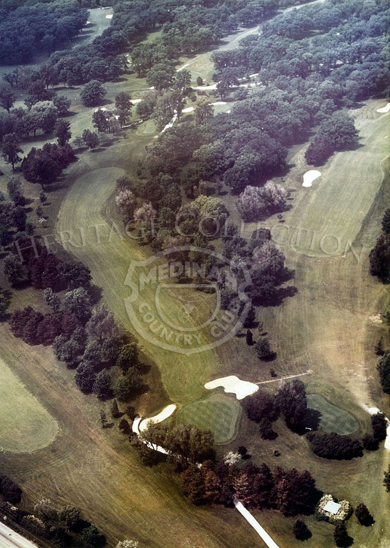 1975 Aerial view of Hole 9 of Course No. 3. The 435-yard par-4 ninth offers a chance to gamble on the tee shot and cut the dog-leg leaving a relatively short approach.