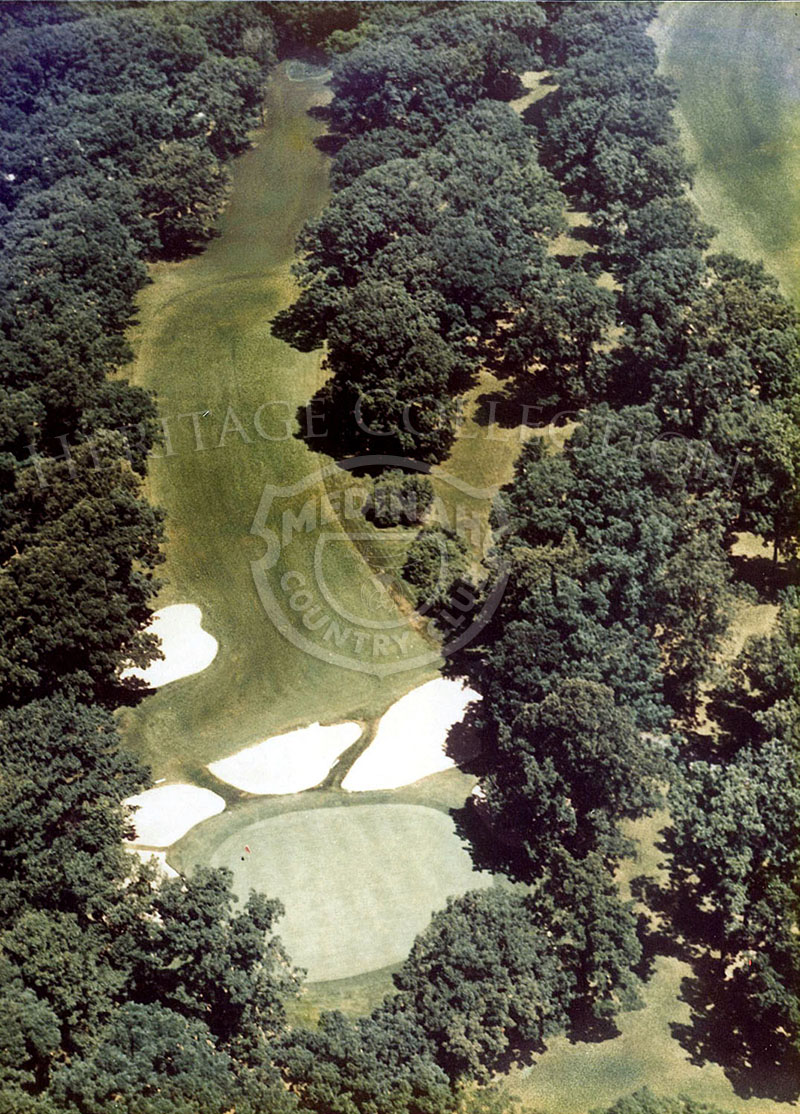 1975 Aerial view of Hole 15 of Course No. 3. The very short par-4 15th is only 318 yards. Most players will take an iron off the tee to the top of a rise and wedge on from there.
