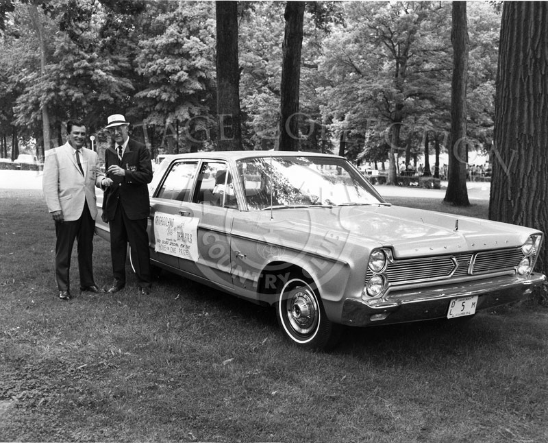A 1966 Plymouth Fury II Silver Special four-door sedan was awarded the unidentified gentleman who scored a Hole-in-One at Medinah Country Club.