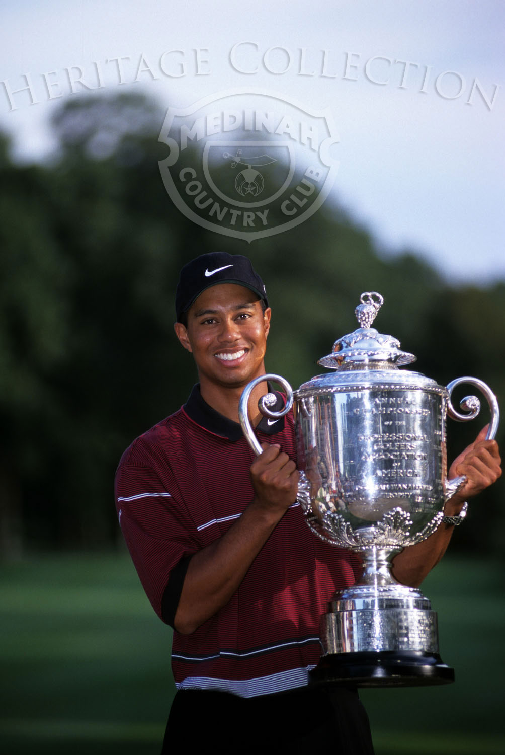 Round 4: Tiger Woods and Trophy: Photographer: Montana Pritchard