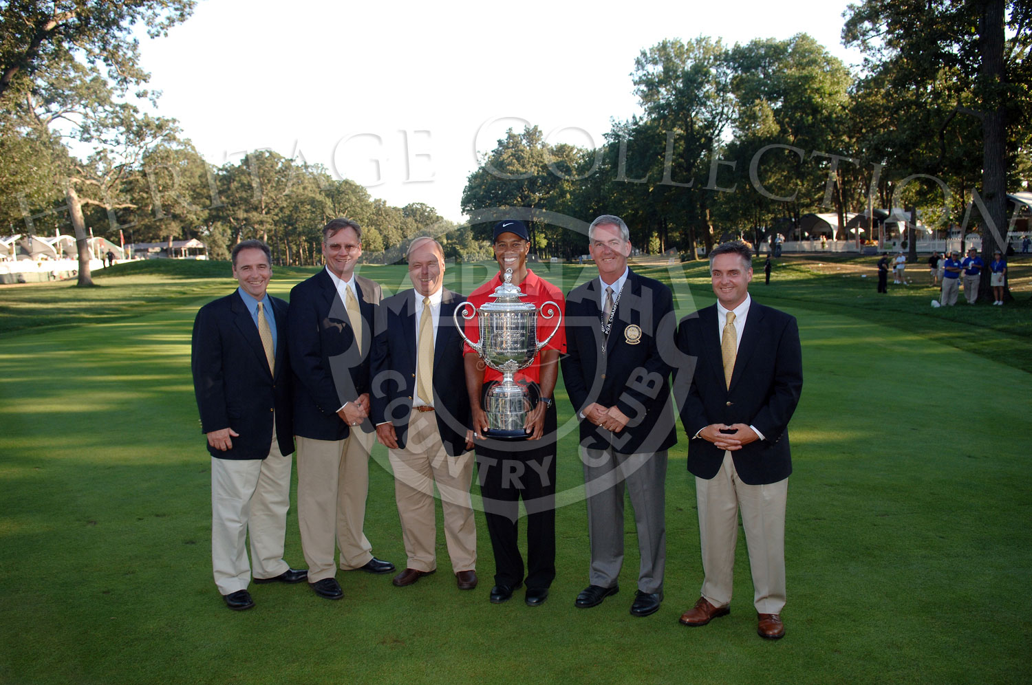 Section directors: Executive Director Michael Miller, President Don Piper, Vice President Terry Russell, Secretary Trey Van Dyke and District Director Tim Marks with Tiger Woods after the 88th PGA Championship in Medinah, Illinois. Sunday, August 20, 2006