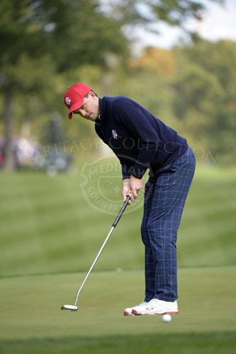 Bradley attempts a birdie putt on the 14th hole.