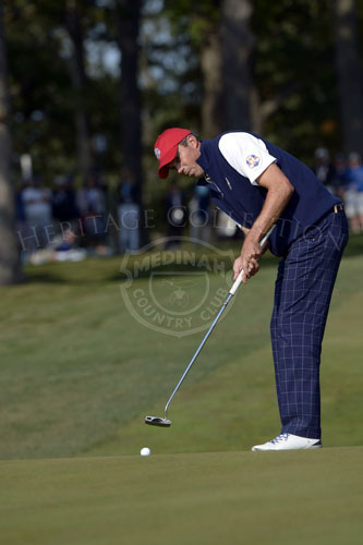 Kuchar rolls his birdie putt during the Friday afternoon matches.