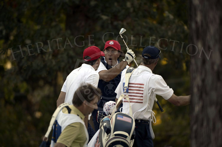 Mickelson is pumped up after he knocked it to 1 foot on the 17th hole to win their match on Friday.