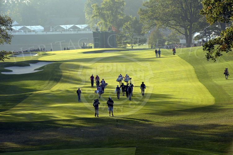 Scene of the first match walking down the 1st hole, early Saturday morning.