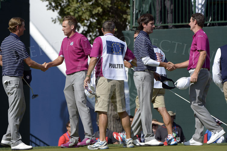 Simpson, Poulter, Watson and Rose shaking hands on the 18th green on Saturday.